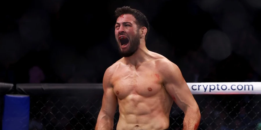 Бывший чемпион UFC Уитакер — о предстоящем поединке между топовыми бойцами