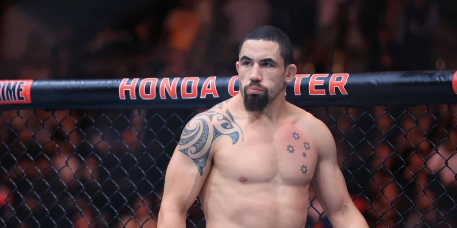 Экс-чемпион UFC среднего веса, Уитакер, превозвысил Перейру