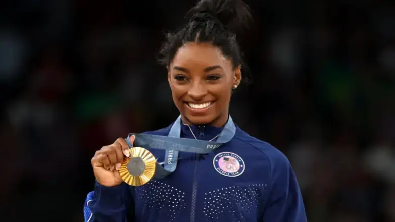 Америкалық гимнаст алты дүркін Олимпиада чемпионы атанды